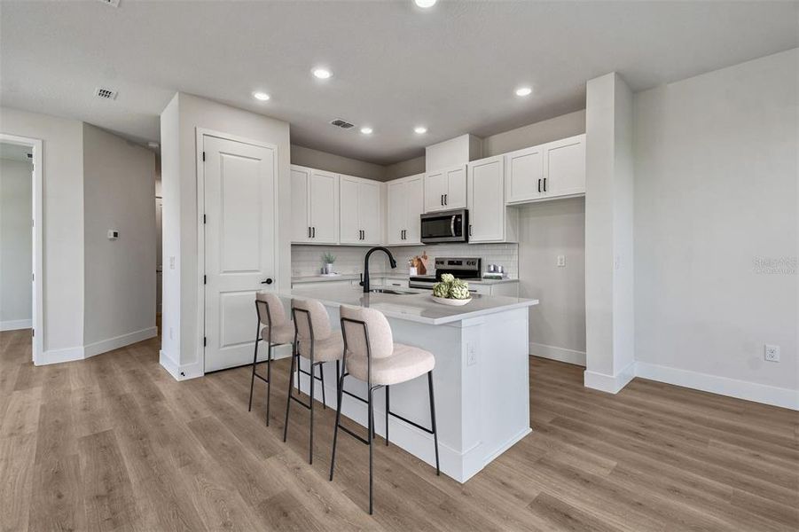 Furnished interior view inside a new home in North River Ranch – Townhomes, Parrish (Image 7).