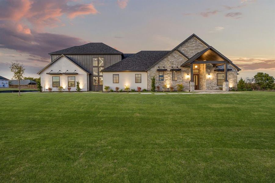 Front exterior of a new home in , Northlake, TX, highlighting curb appeal (Image 1).