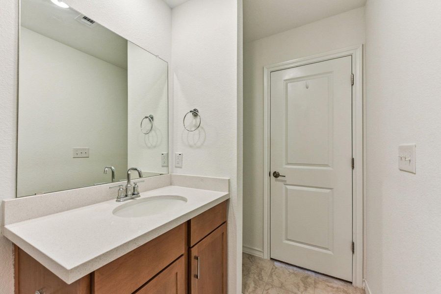 Furnished interior view inside a new home in Stonewall Ranch, Liberty Hill (Image 11).