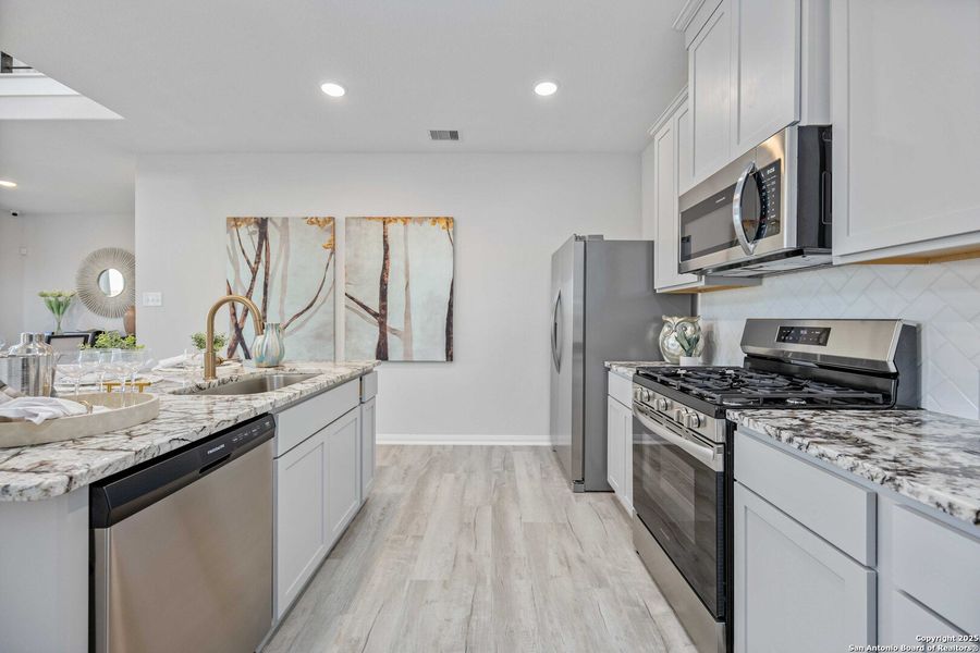 Furnished interior view inside a new home in Red Hawk Landing, San Antonio (Image 13).