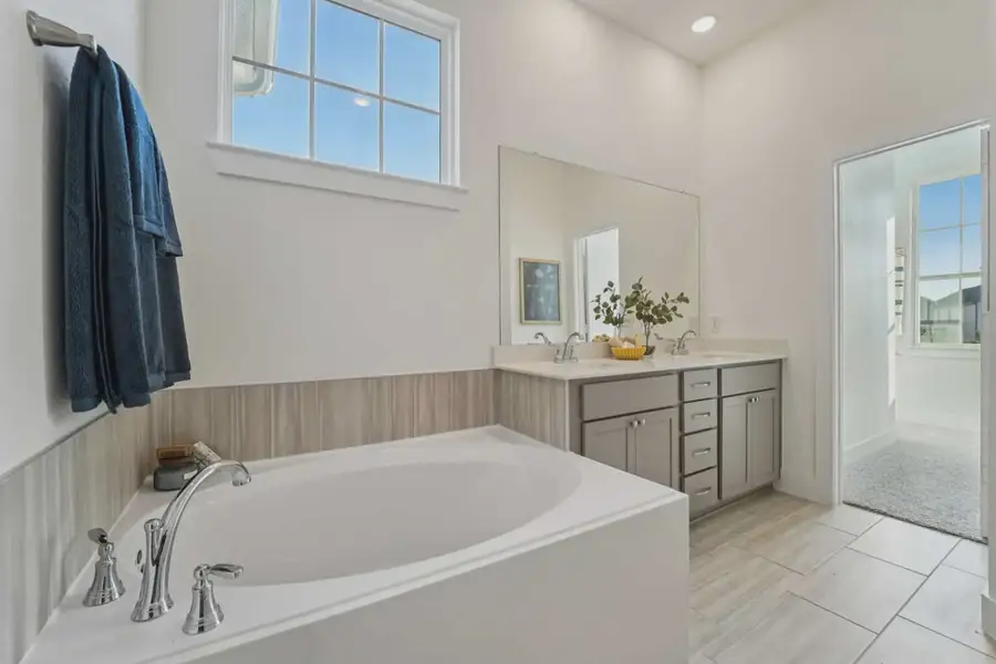 Representative furnished interior of a home built from the Margaux by Chesmar Homes in Bridgeland Chateau, Cypress (Image 29).