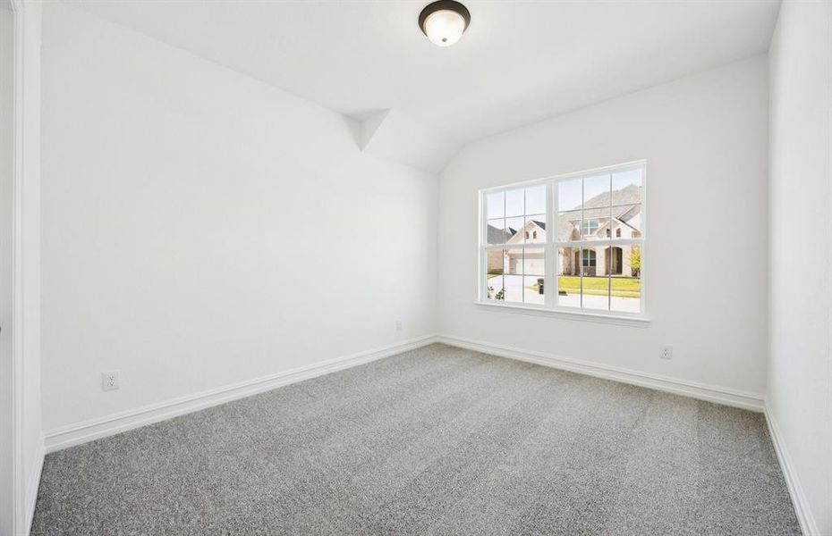 Spacious secondary bedroom with large windows Spacious secondary bedroom with large windows