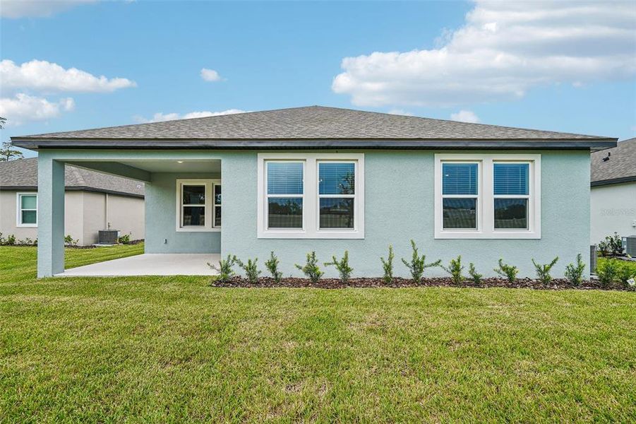 Exterior details and patio area of a home in Legends Preserve - Signature Series, Daytona Beach (Image 28).