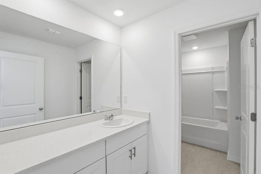 Furnished interior view inside a new home in Waterstone, Groveland (Image 7).