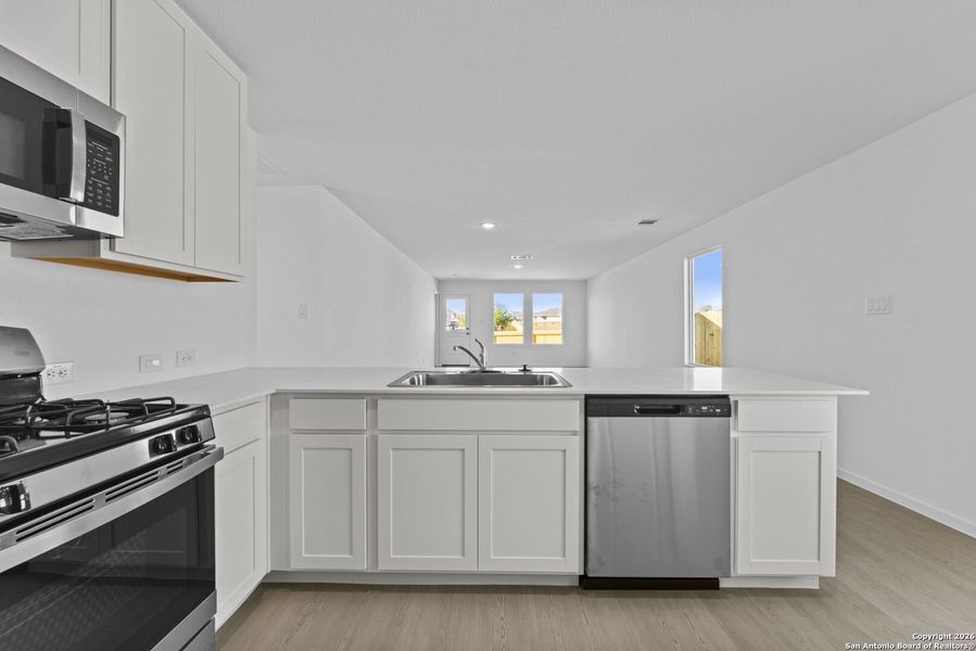 Furnished interior view inside a new home in , New Braunfels (Image 7).