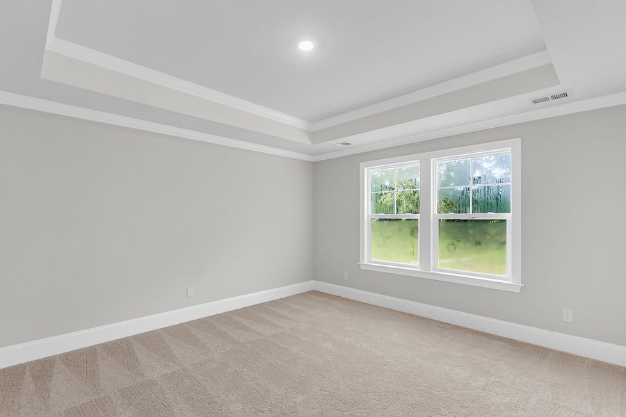 Spacious, unfurnished interior of a new home in Pineland Preserve, Summerville (Image 29).