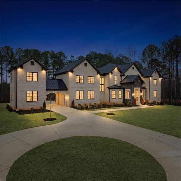 Front exterior of a new home in , Milton, GA, highlighting curb appeal (Image 1). Front exterior of a new home in , Milton, GA, highlighting curb appeal (Image 1).