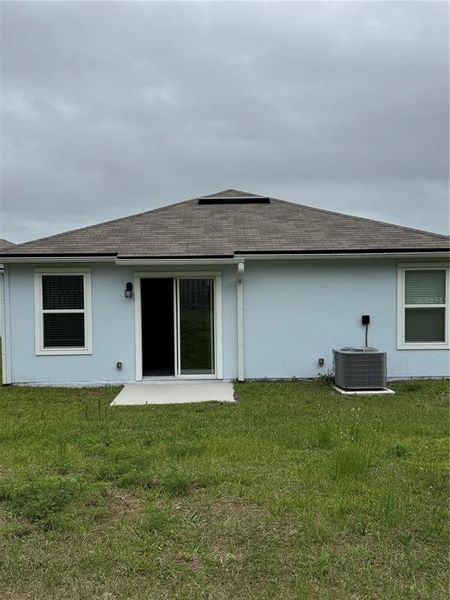 Exterior details and patio area of a home in Ravenswood Village, St. Augustine (Image 3).