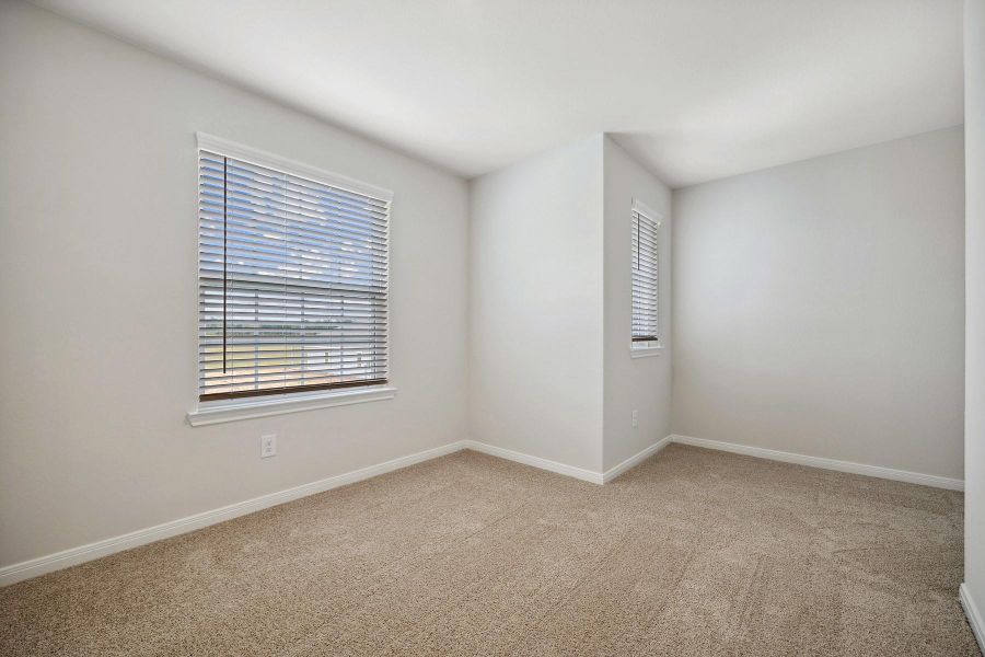 Spacious, unfurnished interior of a new home in Trails at Cochran Ranch, Waller (Image 12).