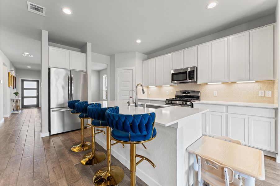 Furnished interior view inside a new home in Sunterra, Katy (Image 3). Furnished interior view inside a new home in Sunterra, Katy (Image 3).