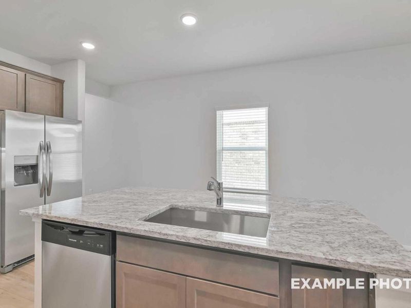 Furnished interior view inside a new home in Caney Creek Place, Conroe (Image 10).
