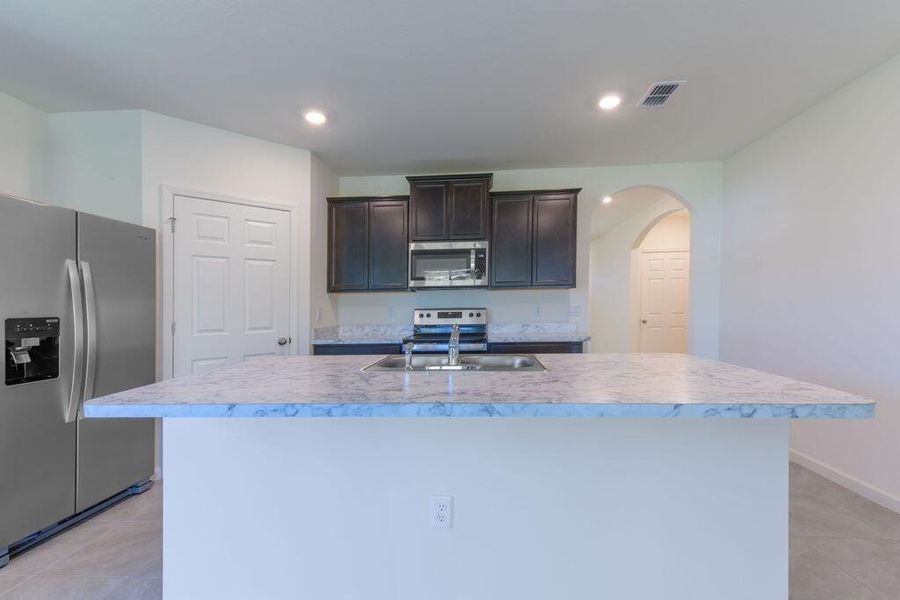 Furnished interior view inside a new home in , Port St. Lucie (Image 6).