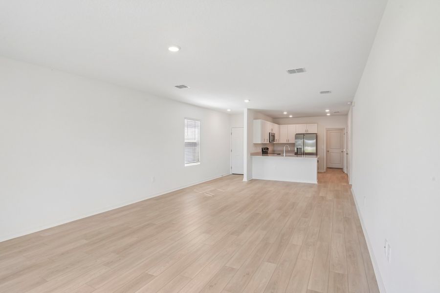 Representative unfurnished interior of a home built from the Blackbird by Taylor Morrison in Westview Community Group Page, Kissimmee (Image 9).