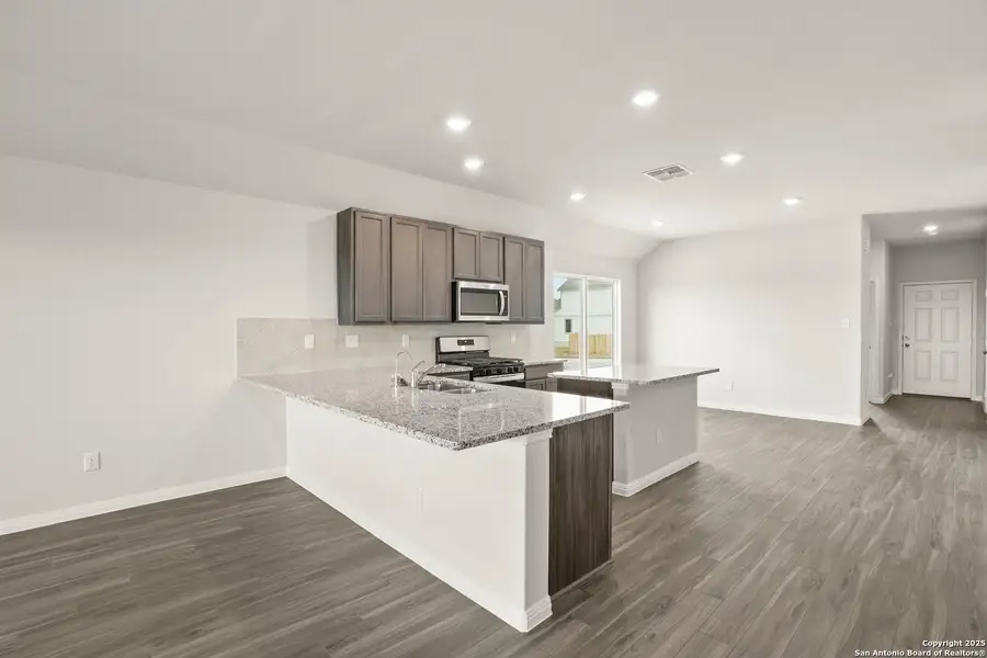Furnished interior view inside a new home in Hunters Ranch, San Antonio (Image 10).