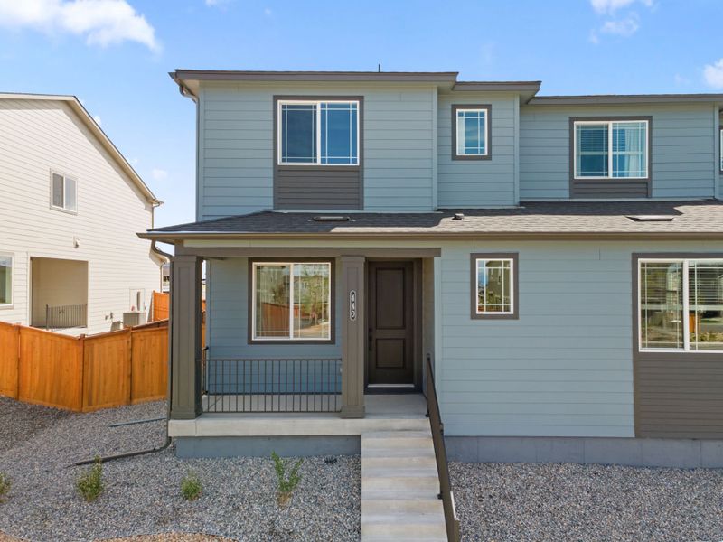 Exterior details and patio area of a home in Sky Ranch, Watkins (Image 4).