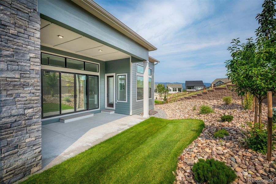 Front exterior of a new home in Cloverleaf - Pinnacle Collection, Monument, CO, highlighting curb appeal (Image 23).