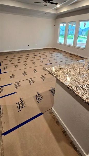 Furnished interior view inside a new home in Sunterra, Katy (Image 9).