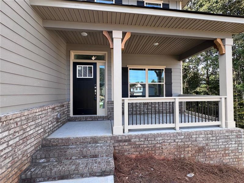 Front exterior of a new home in Magnolia Villas, Cornelia, GA, highlighting curb appeal (Image 19). Front exterior of a new home in Magnolia Villas, Cornelia, GA, highlighting curb appeal (Image 19).
