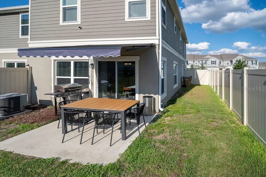 Exterior details and patio area of a home in , Davenport (Image 3).