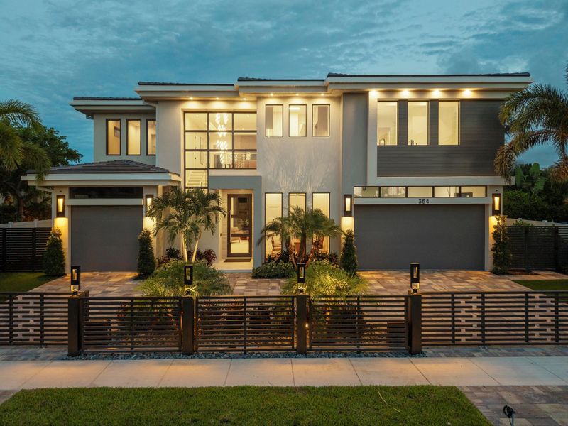 Front exterior of a new home in , Boca Raton, FL, highlighting curb appeal (Image 22). Front exterior of a new home in , Boca Raton, FL, highlighting curb appeal (Image 22).