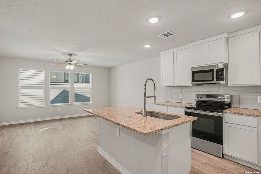 Furnished interior view inside a new home in , San Antonio (Image 9).
