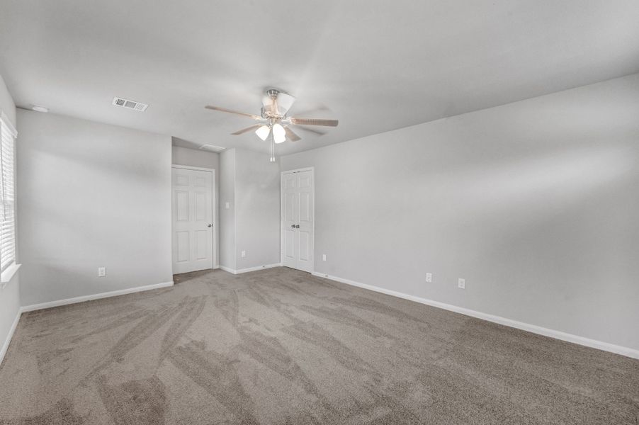 Representative unfurnished interior of a home built from the Floor Plan 1774 by Colina Homes in Rollingbrook Estates, Baytown (Image 19).