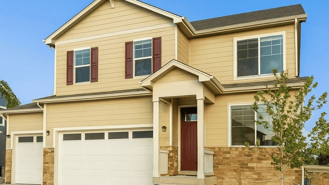 Front exterior of a new home in Vantage, Berthoud, CO, highlighting curb appeal (Image 1).