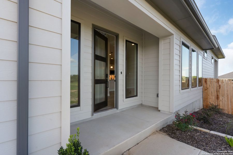 Front exterior of a new home in Nolte Farms, Seguin, TX, highlighting curb appeal (Image 26).