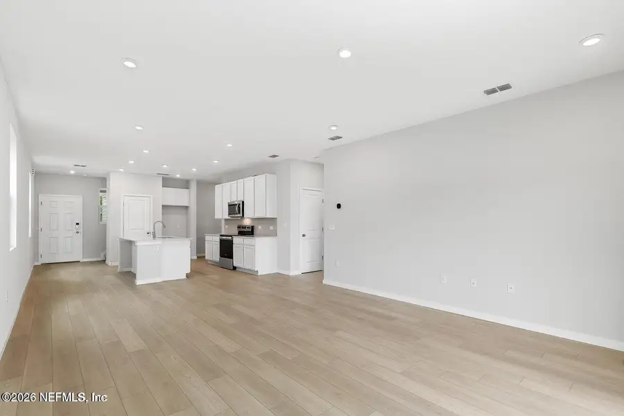 Spacious, unfurnished interior of a new home in The Landings at Pecan Park, Jacksonville (Image 7).