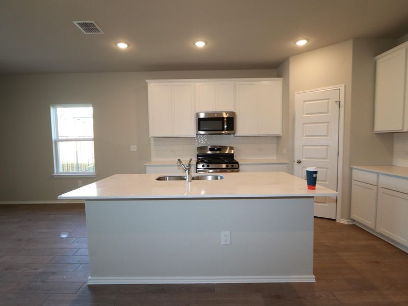 Furnished interior view inside a new home in Cascades at Onion Creek, Austin (Image 5). Furnished interior view inside a new home in Cascades at Onion Creek, Austin (Image 5).