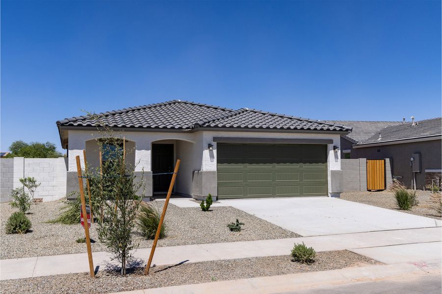 Front exterior of a new home in Rancho Santa Rosa, Maricopa, AZ, highlighting curb appeal (Image 2).