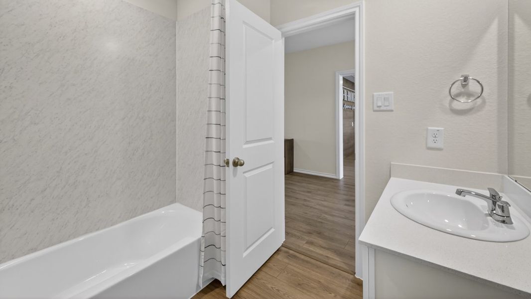 Representative furnished interior of a home built from the Harrison by D.R. Horton in The Hills of Sherman, Sherman (Image 16).