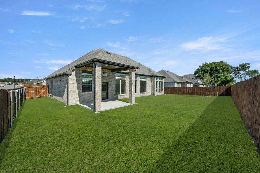 Exterior details and patio area of a home in Kentsdale Farms, DeSoto (Image 26). Exterior details and patio area of a home in Kentsdale Farms, DeSoto (Image 26).