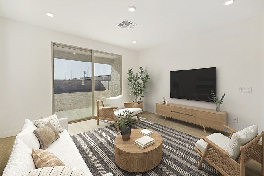 Furnished interior view inside a new home in Windrose V, Waddell (Image 5).