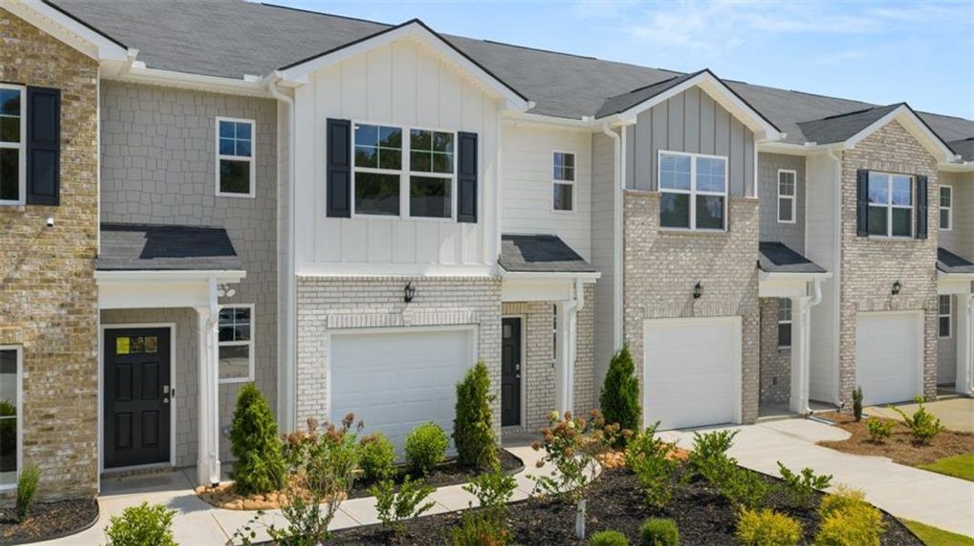 Front exterior of a new home in The Gables at Agricultural Village, Perry, GA, highlighting curb appeal (Image 2). Front exterior of a new home in The Gables at Agricultural Village, Perry, GA, highlighting curb appeal (Image 2).
