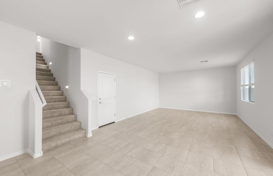 Spacious, unfurnished interior of a new home in Asante- Atrium Series, Surprise (Image 22).