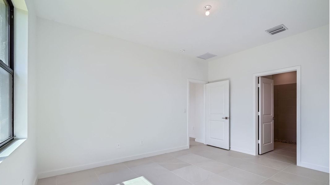 Representative unfurnished interior of a home built from the Cali by D.R. Horton in Twin Oaks, Stuart (Image 15).
