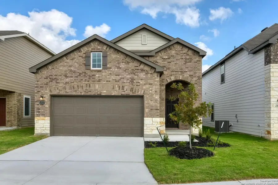 Front exterior of a new home in Meadows at Hennersby Hollow 40's, San Antonio, TX, highlighting curb appeal (Image 1).
