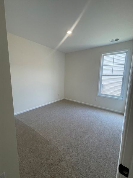 Spacious, unfurnished interior of a new home in Springwood Grove, Central (Image 16).