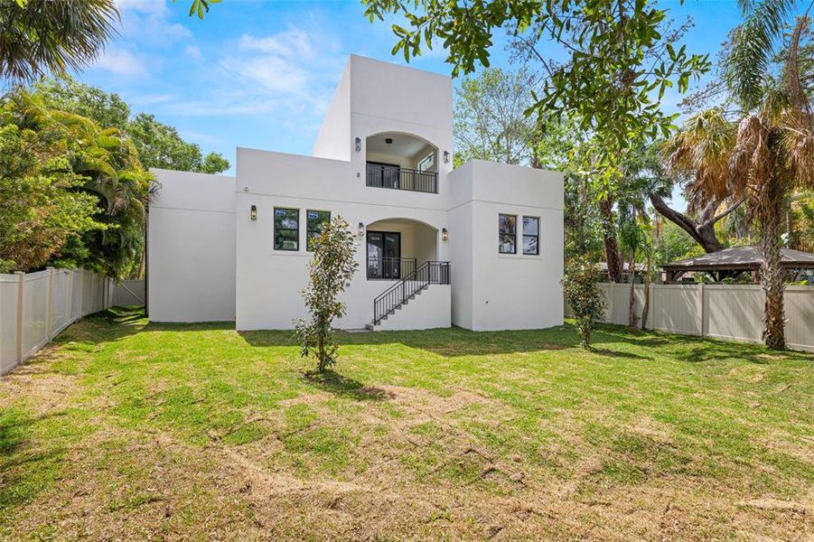 Front exterior of a new home in , Tampa, FL, highlighting curb appeal (Image 1).