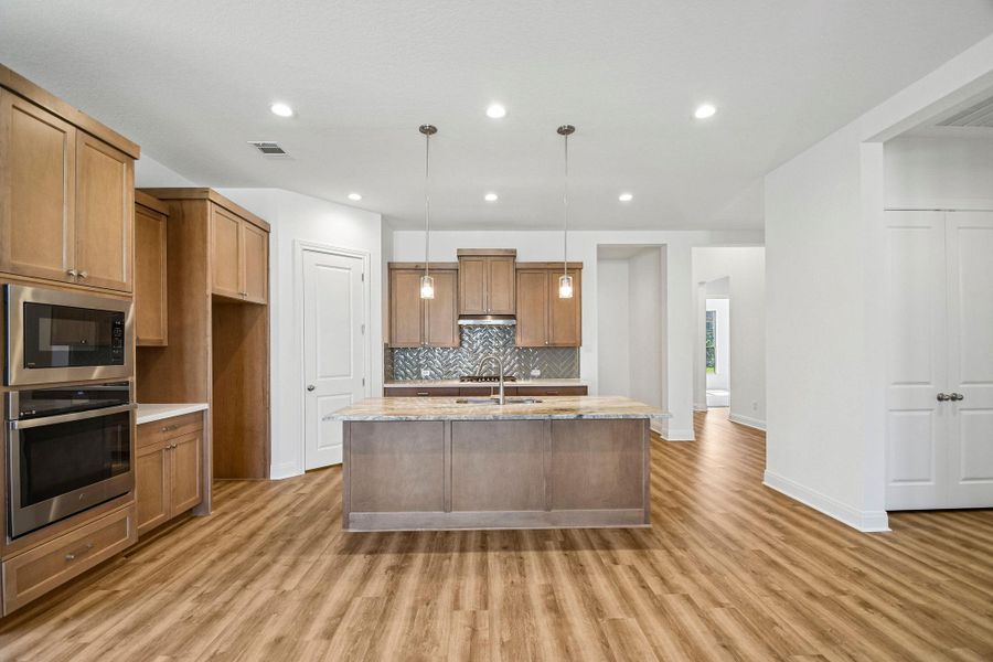 Furnished interior view inside a new home in 6 Creeks, Kyle (Image 12).