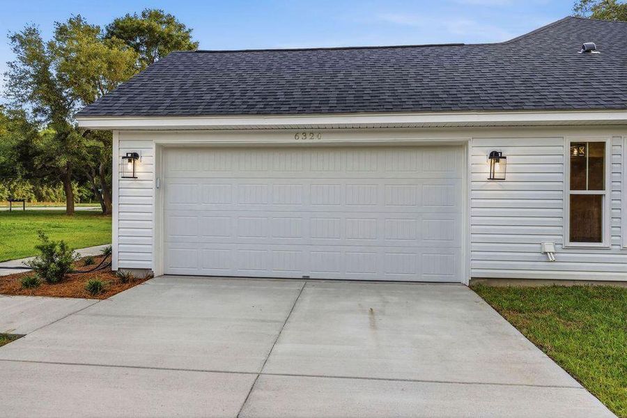 Exterior details and patio area of a home in , Awendaw (Image 39).