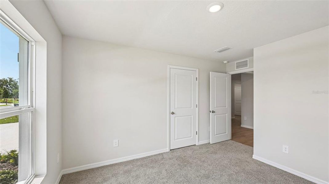 Spacious, unfurnished interior of a new home in Rye Crossing, Parrish (Image 31).