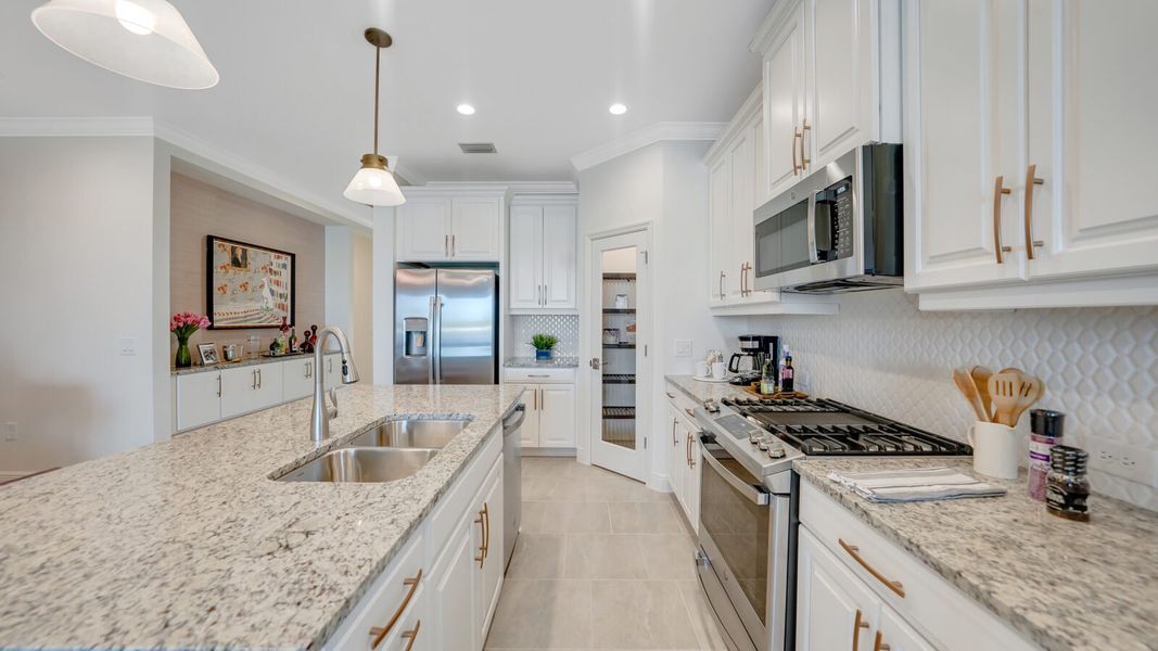 Representative furnished interior of a home built from the Dream 2 by Neal Communities in Verandah, Fort Myers (Image 12).