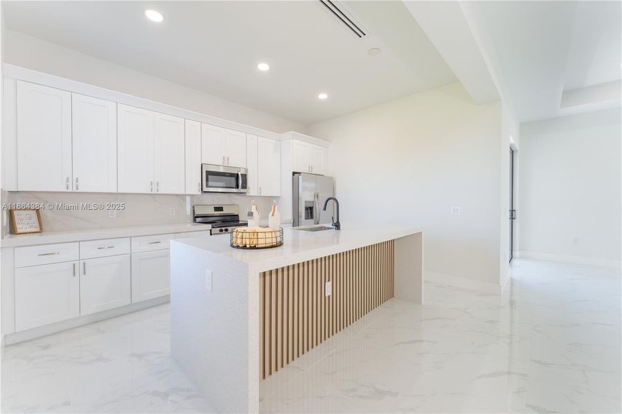 Furnished interior view inside a new home in , Cape Coral (Image 4).