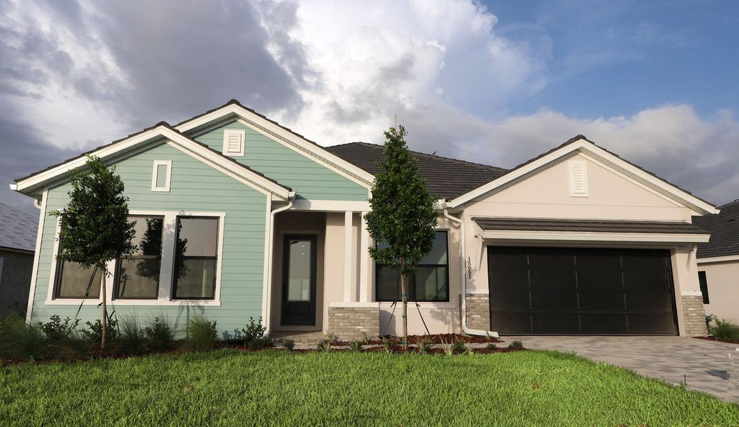 Representative exterior photo of a completed home built from the The Colston by David Weekley Homes in Palmera Wellen Park - Classic Series, Venice, FL (Image 2).