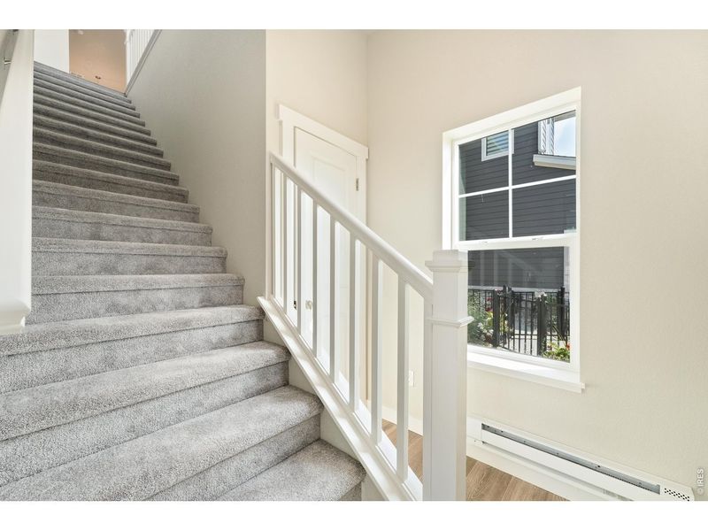 Spacious, unfurnished interior of a new home in The Lakes at Centerra, Loveland (Image 39).