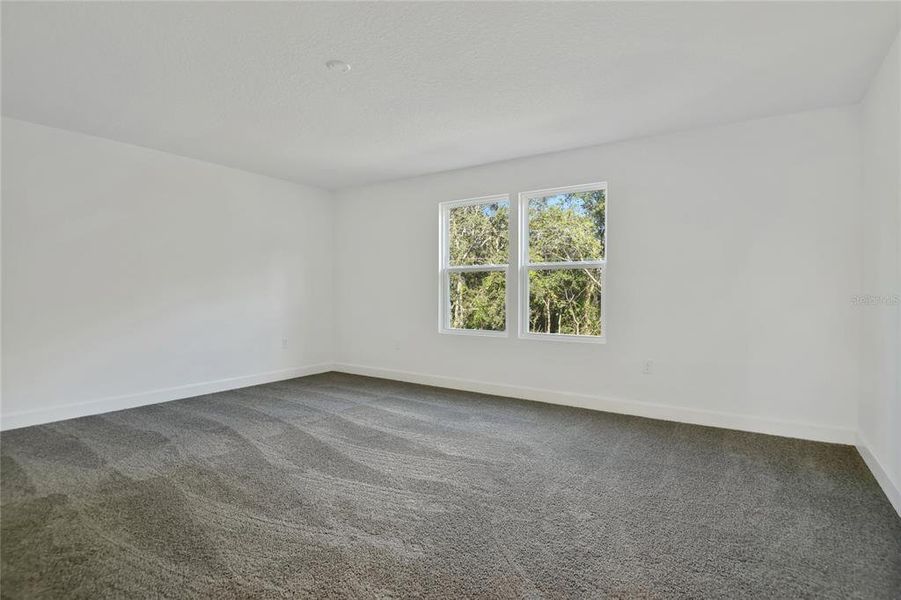 Spacious, unfurnished interior of a new home in Seasons at Wekiva Ridge, Mount Dora (Image 19).