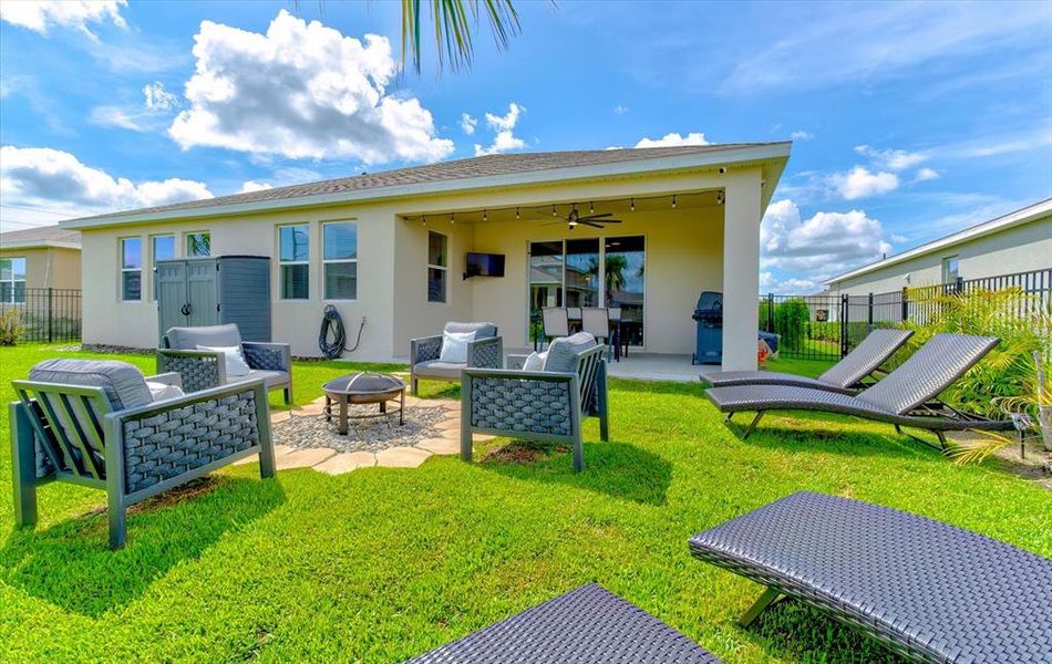 Exterior details and patio area of a home in Archers Mill, Ormond Beach (Image 28).
