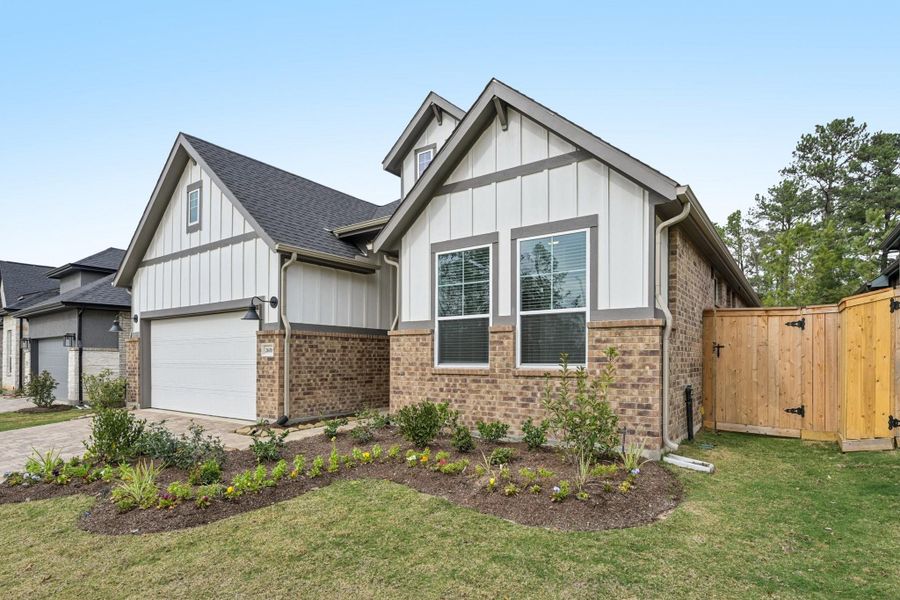 Front exterior of a new home in Kresston 50's, Montgomery, TX, highlighting curb appeal (Image 27). Front exterior of a new home in Kresston 50's, Montgomery, TX, highlighting curb appeal (Image 27).